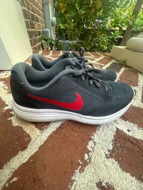 Nike Dark Gray Mesh Trainers with Red Swoosh Kids Size 5Y
